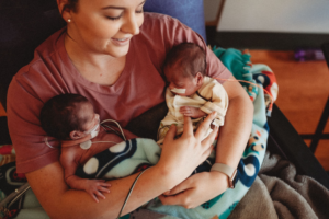 Homecoming and Ongoing Progress After 118 days of continuous NICU care, Reagan achieved respiratory independence and weight gain milestones, allowing her to finally join her sister at home. Now thriving alongside her twin sister, Reagan continues to meet developmental milestones. While the physical size difference between the two sisters remains visible, medical teams note that both girls are healthy, vibrant, and making steady developmental progress. Audrieanna reflects on her daughter's journey not as a collection of clinical risks, but as a testament to perseverance and hope.